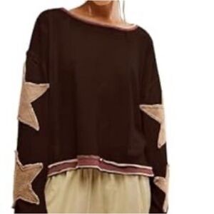 Brownish sweatshirt with star accents